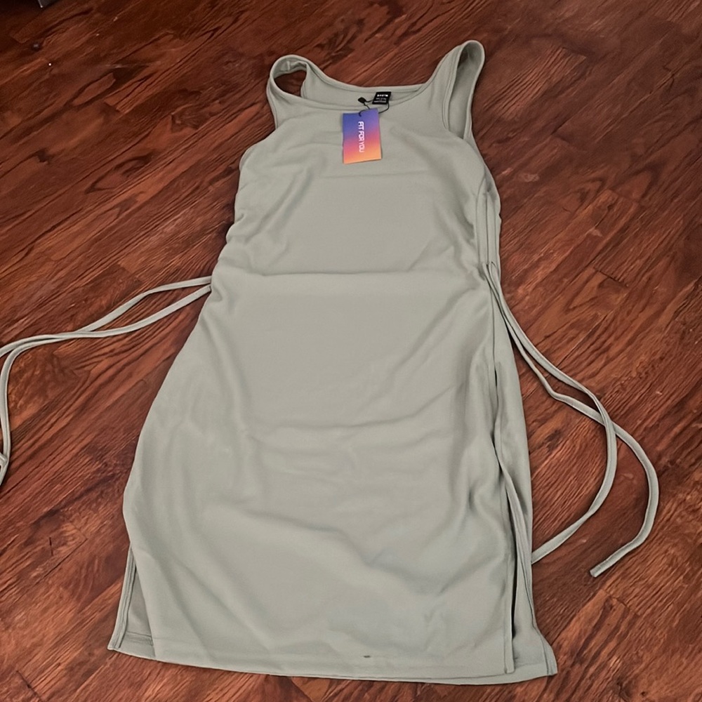 Large green summer dress with cinch straps